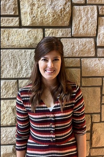 Megan Schapaugh - headshot of a female with dark hair
