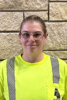 headshot of a female with glasses