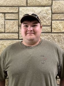 man wearing a ballcap and dark tshirt