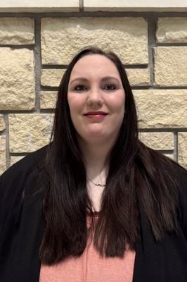 Headshot of Female with long, dark hair