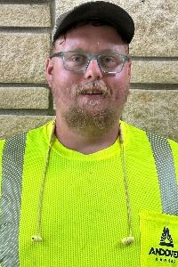 Headshot of a male with glasses and light hair