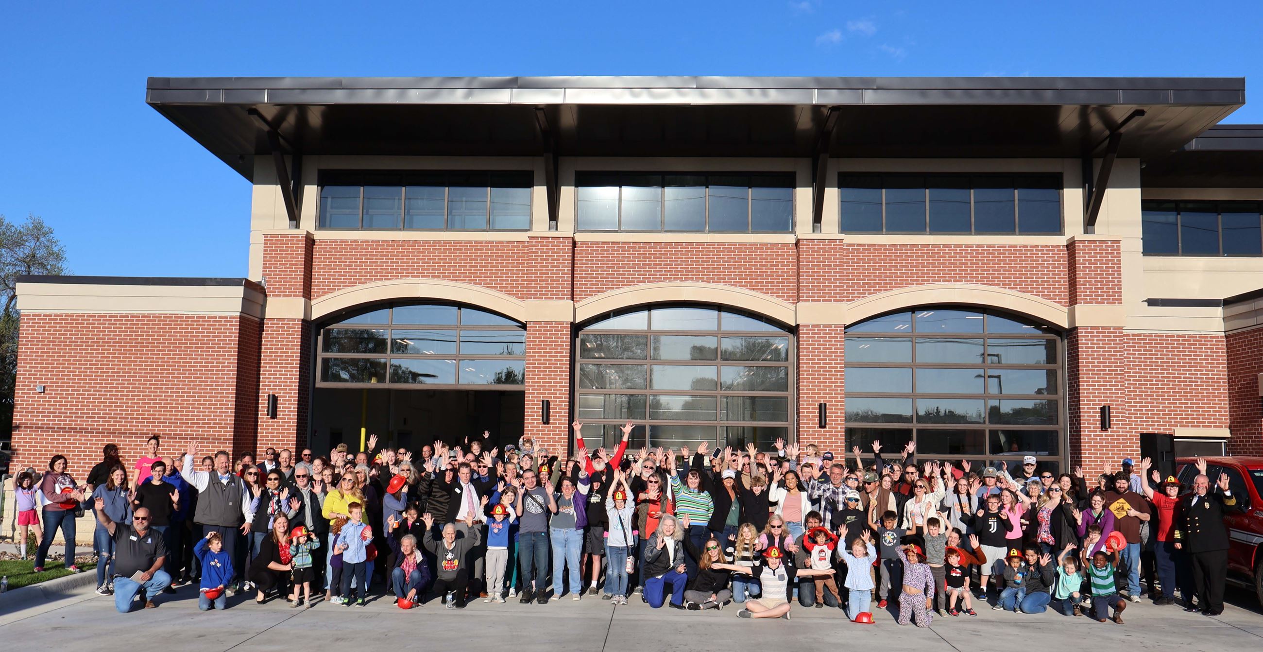 photo of group outside of fire station 2 